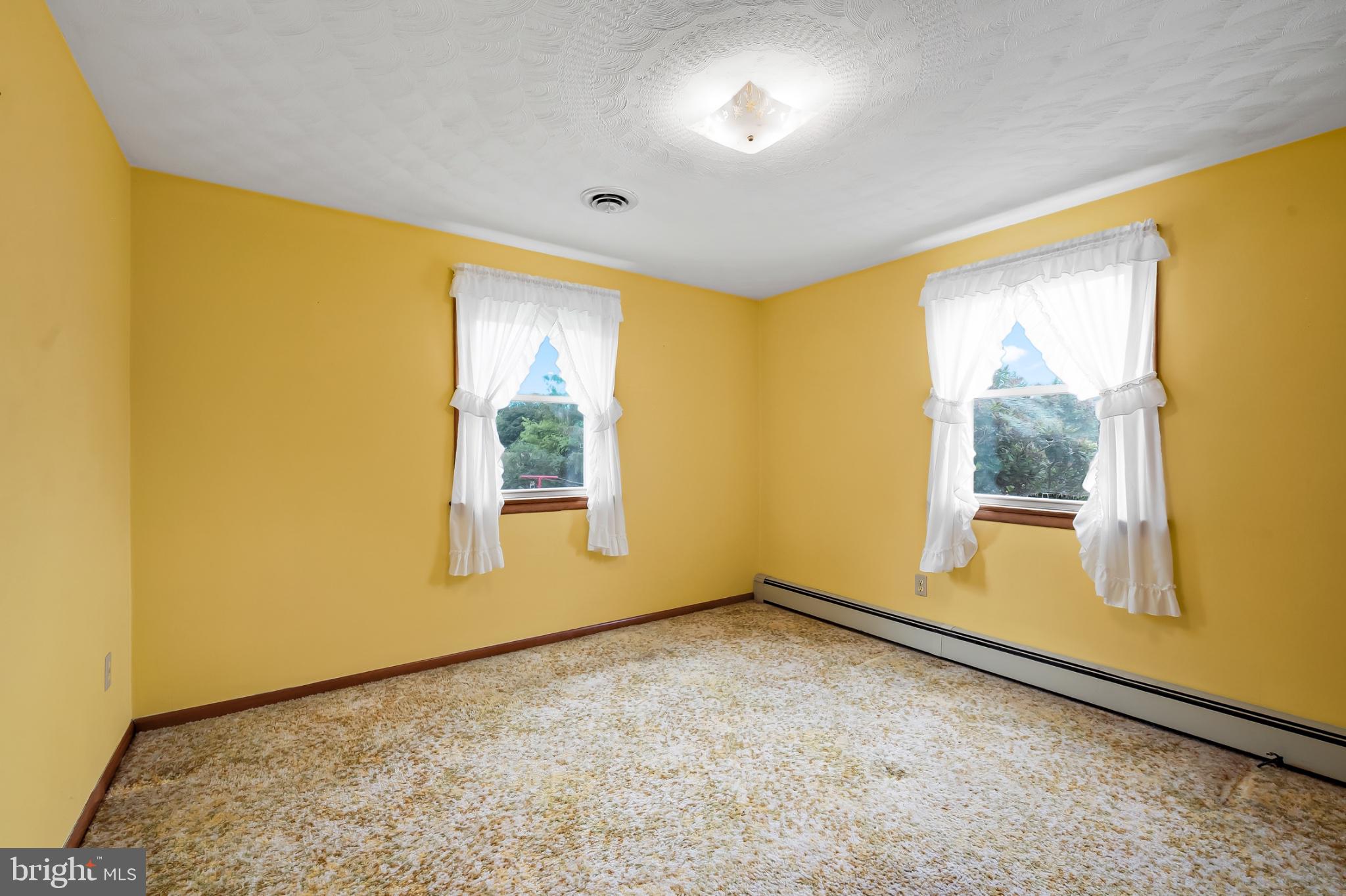 2100 Peterman Road Freeland, MD 21053 - Photo 22 of 36 Bright and cheerful yellow retreat.
