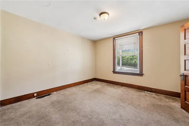 an empty room with closet