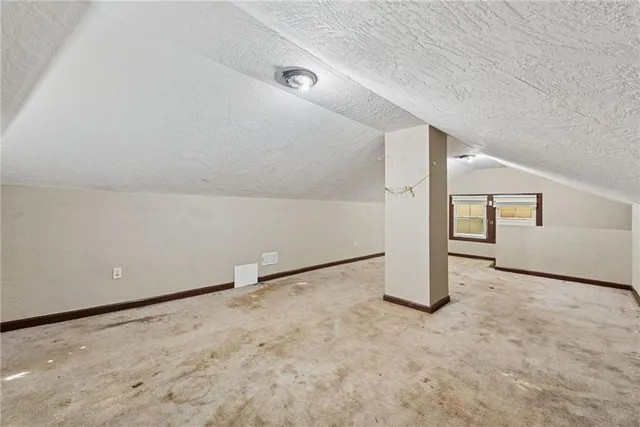 a kitchen with stainless steel appliances granite countertop a refrigerator oven a sink and dishwasher