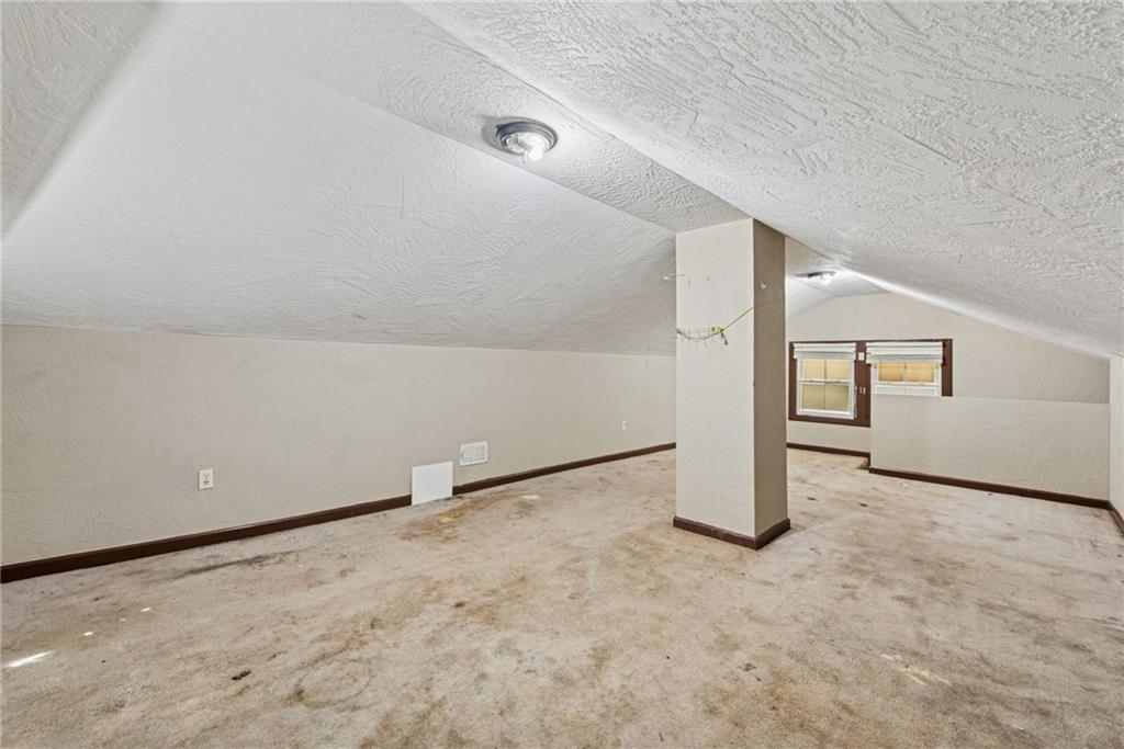 1442 Rostraver Street Monessen, PA 15062 - Photo 22 of 29 a view of an empty room