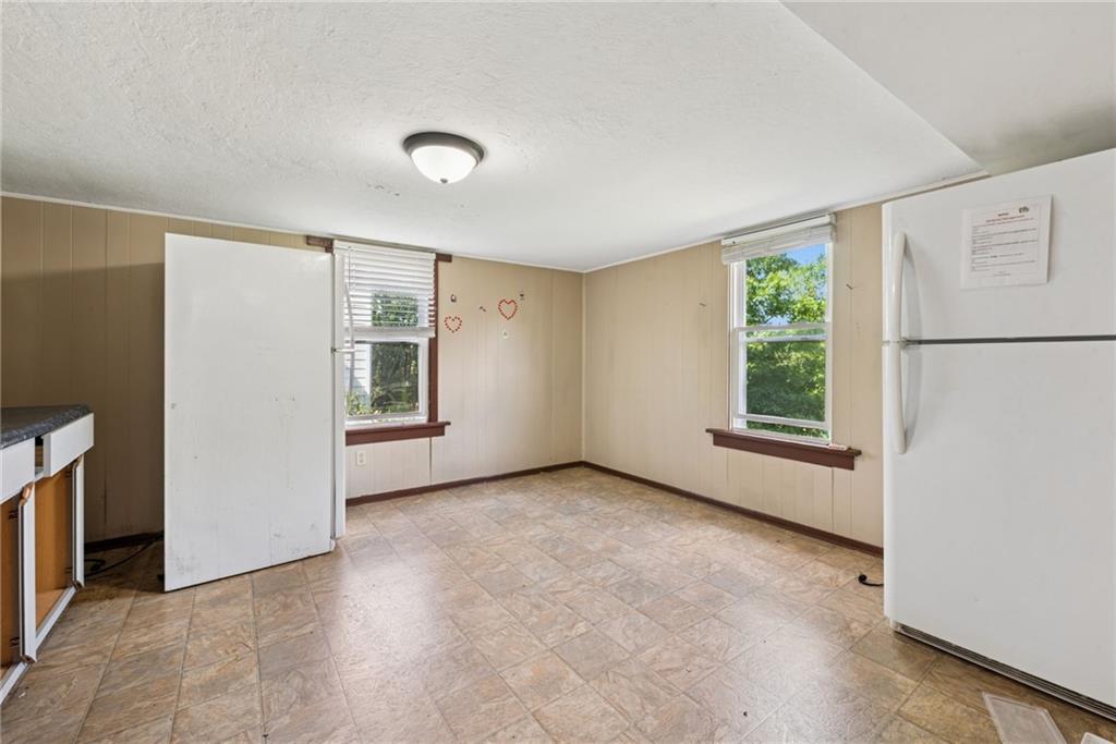 1442 Rostraver Street Monessen, PA 15062 - Photo 25 of 29 a view of an empty room with a window