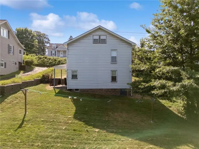 a house with river in front of it
