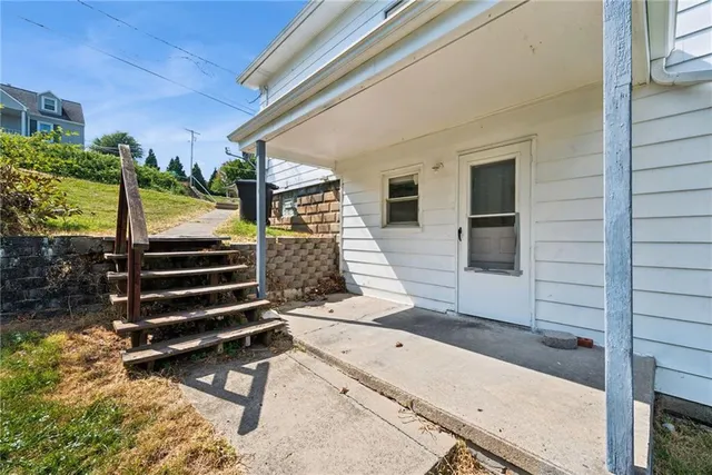 a view of backyard with cabin