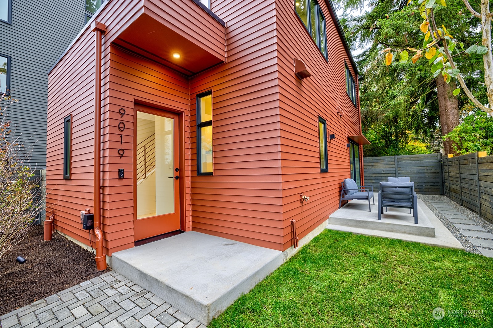 a front view of a house with a yard