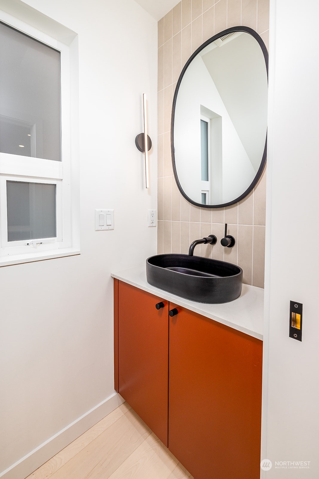 9019 8th Avenue Northeast Seattle, WA 98115 - Photo 9 of 14 a close view of a sink and a mirror