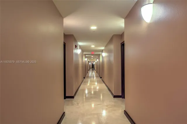 a view of a swimming pool with outdoor seating space