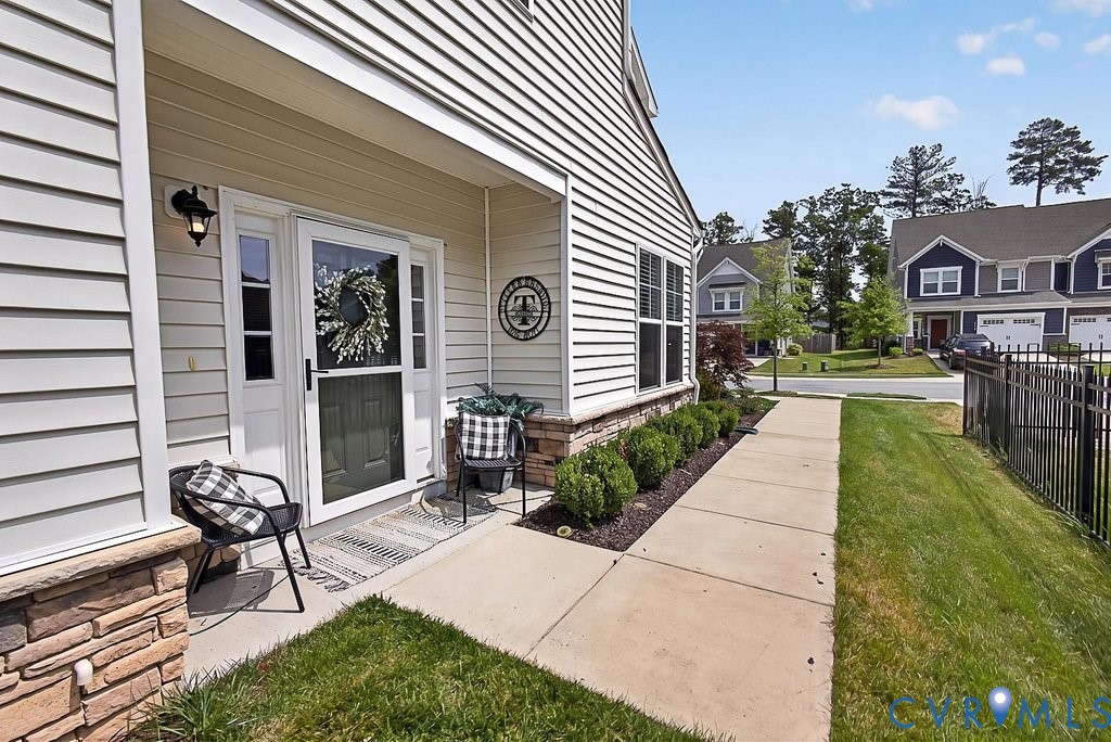 18517 Palisades Ridge Moseley, VA 23120 - Photo 45 of 55 a view of a house with backyard and sitting area