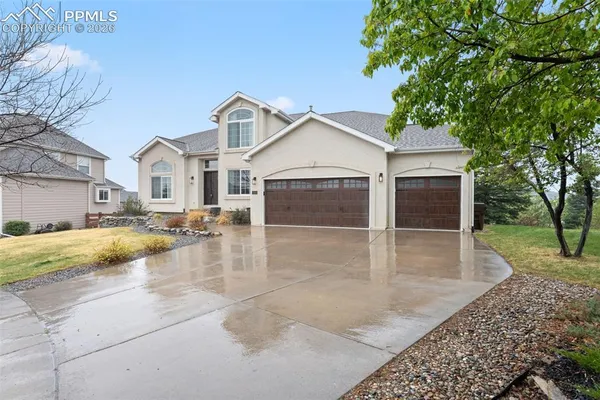 a view of a house with swimming pool