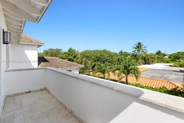 a view of a balcony with an outdoor space