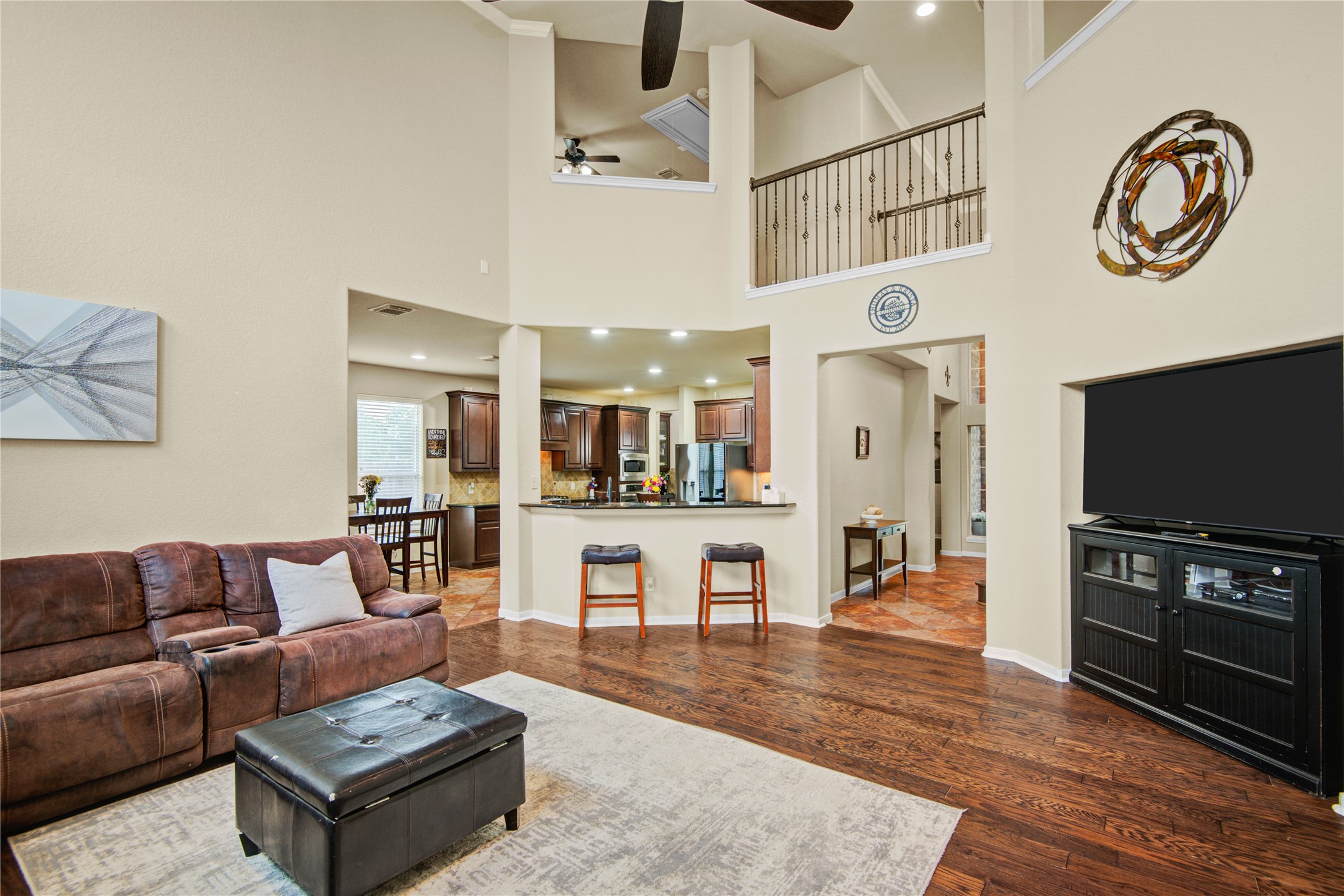 6007 Valhalla Drive Spring, TX 77379 - Photo 16 of 37 The family room seamlessly connects to the kitchen and foyer, creating exceptional flow for both relaxing and hosting guests.
