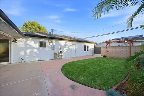 a view of a back yard of the house