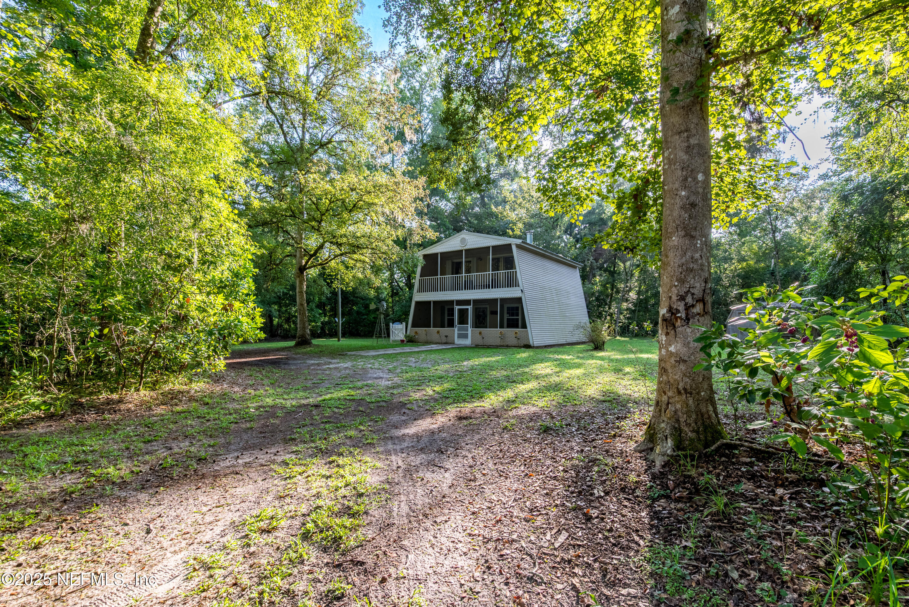 141 Southwest Longhorn Terrace Fort White, FL 32038 - Photo 1 of 31 a view of a house with a yard