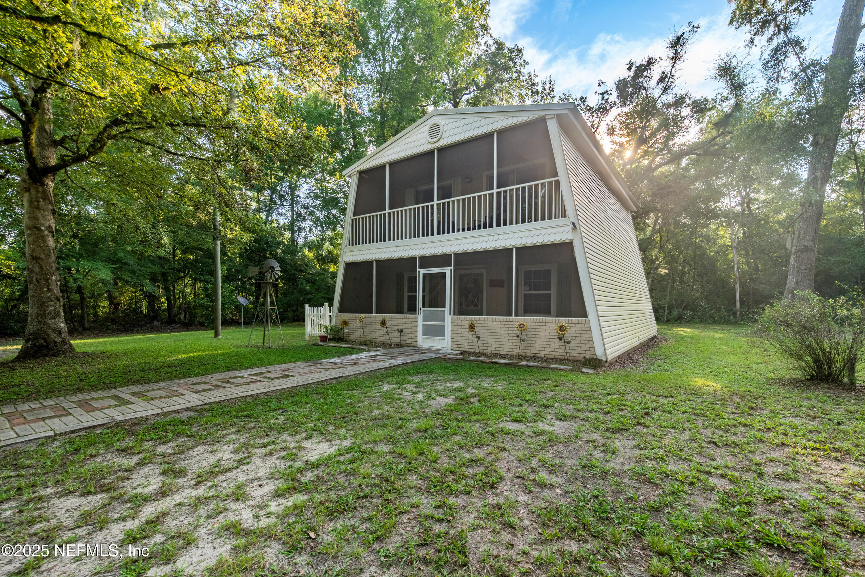 141 Southwest Longhorn Terrace Fort White, FL 32038 - Photo 2 of 31 a view of a house with a yard