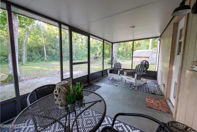 a living room with a couch and a table