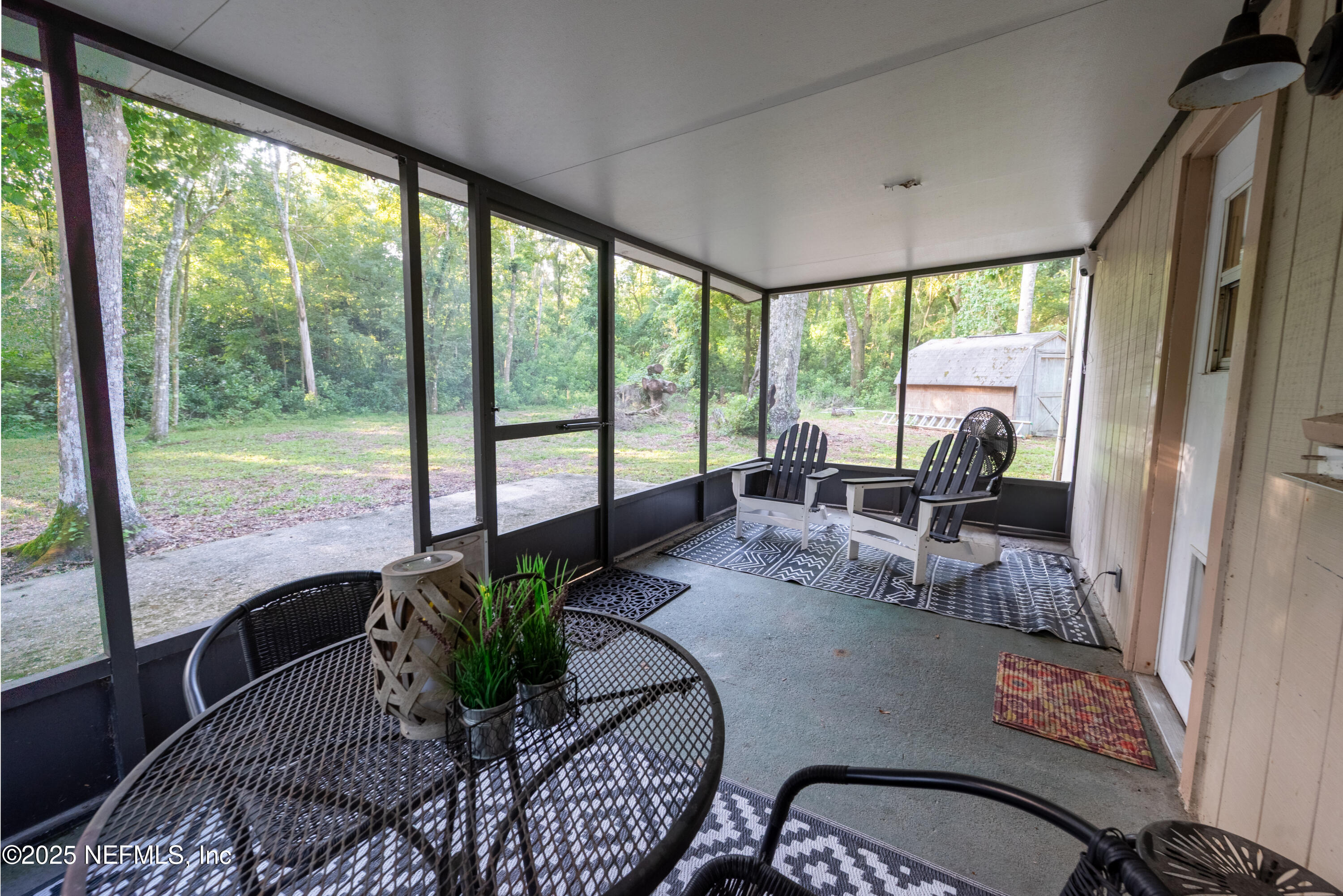 141 Southwest Longhorn Terrace Fort White, FL 32038 - Photo 22 of 31 a living room with furniture and a large window