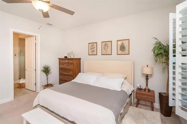a kitchen with stainless steel appliances kitchen island granite countertop a sink and cabinets