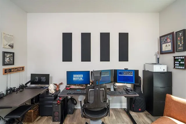 a en suite bathroom with a sink double vanity and a mirror