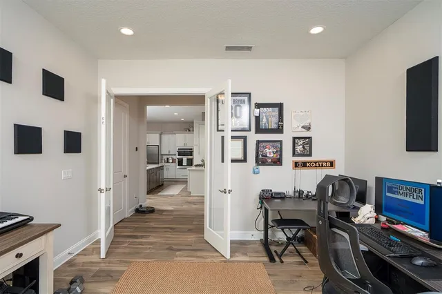 a bathroom with a shower curtain and a bathtub