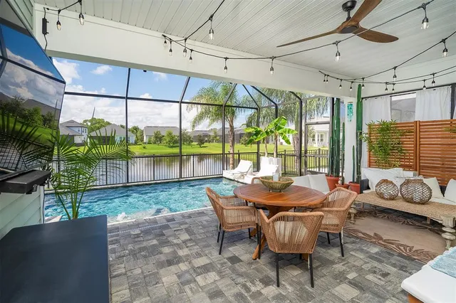 a dining room with furniture mountain view and balcony