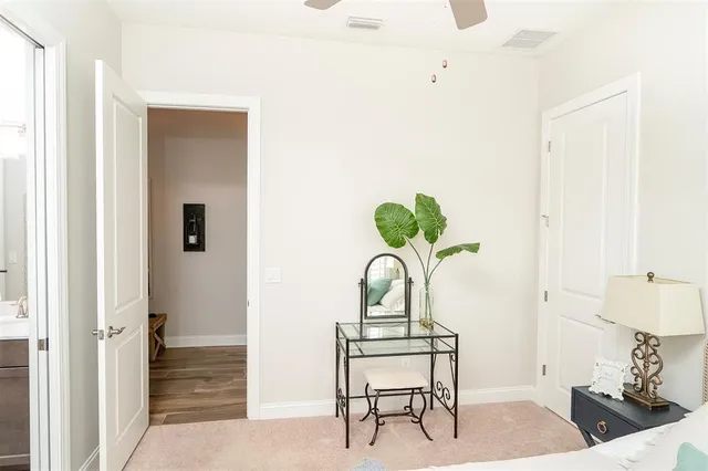 a view of house with backyard and outdoor seating