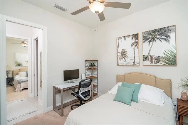 a room with gym equipment and windows