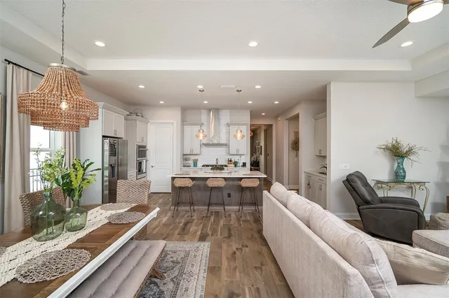 a very nice looking dining room with a table and chairs