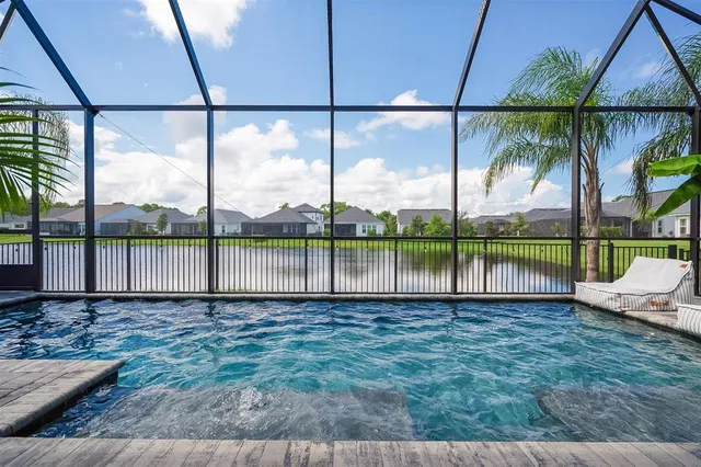 a view of living room and dining room