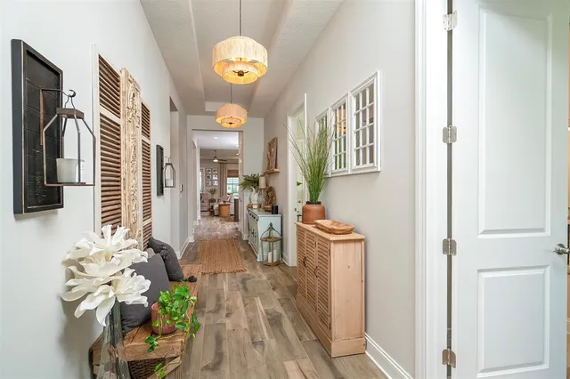 a bathroom with a double vanity sink mirror and shower