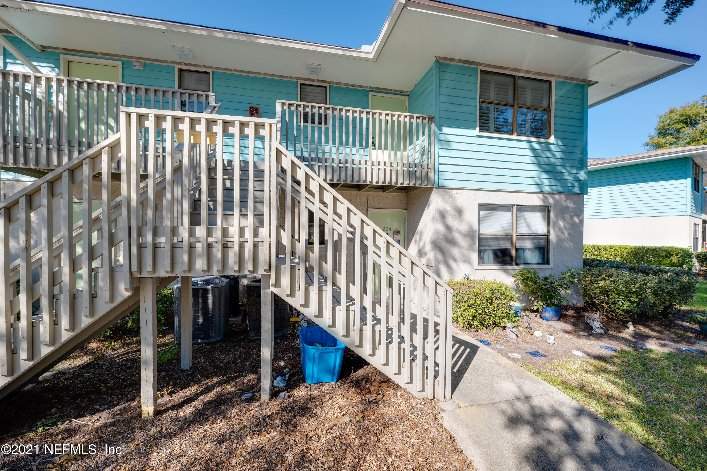 650 Pope Road, Unit 228 St. Augustine, FL 32080 - Photo 19 of 20 a view of a house with backyard and porch