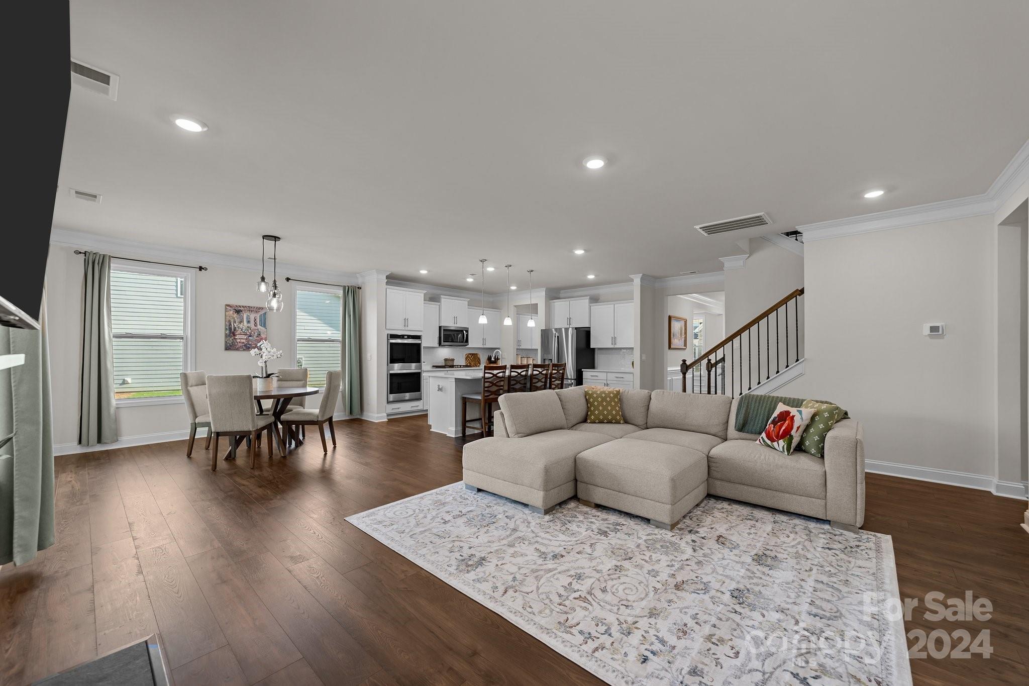 6037 Treehouse Drive Charlotte, NC 28214 - Photo 14 of 48 a living room with furniture and wooden floor