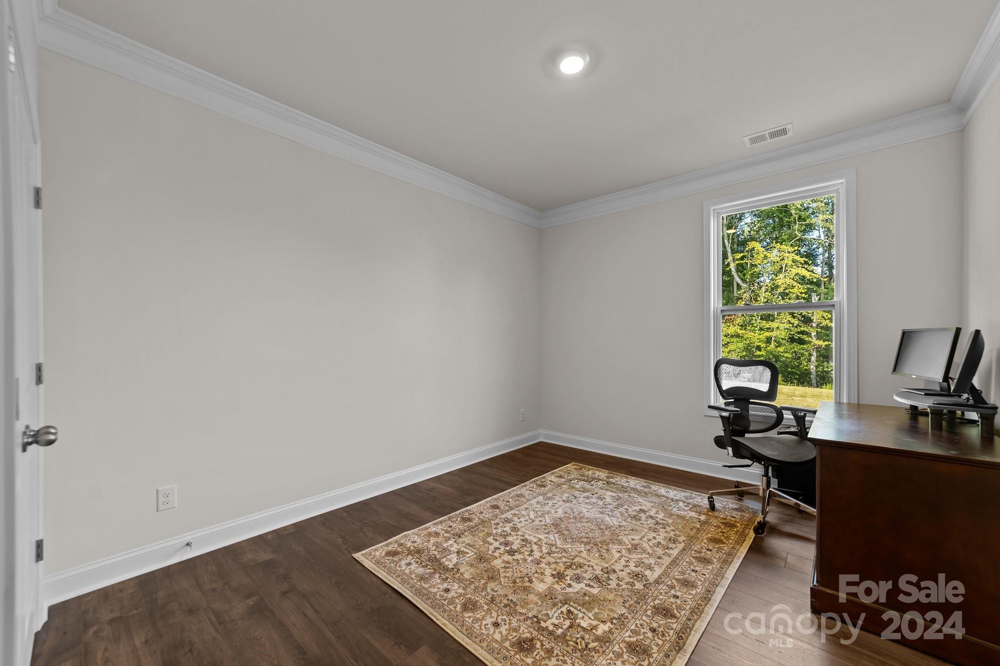 6037 Treehouse Drive Charlotte, NC 28214 - Photo 18 of 48 a room with a window