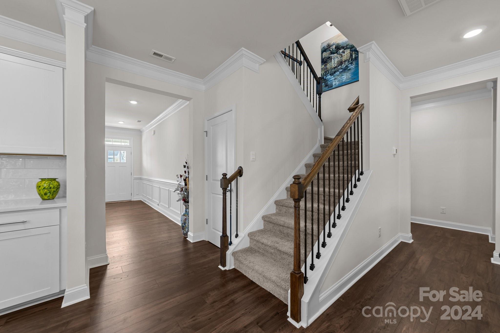 6037 Treehouse Drive Charlotte, NC 28214 - Photo 20 of 48 a view of entryway with wooden floor