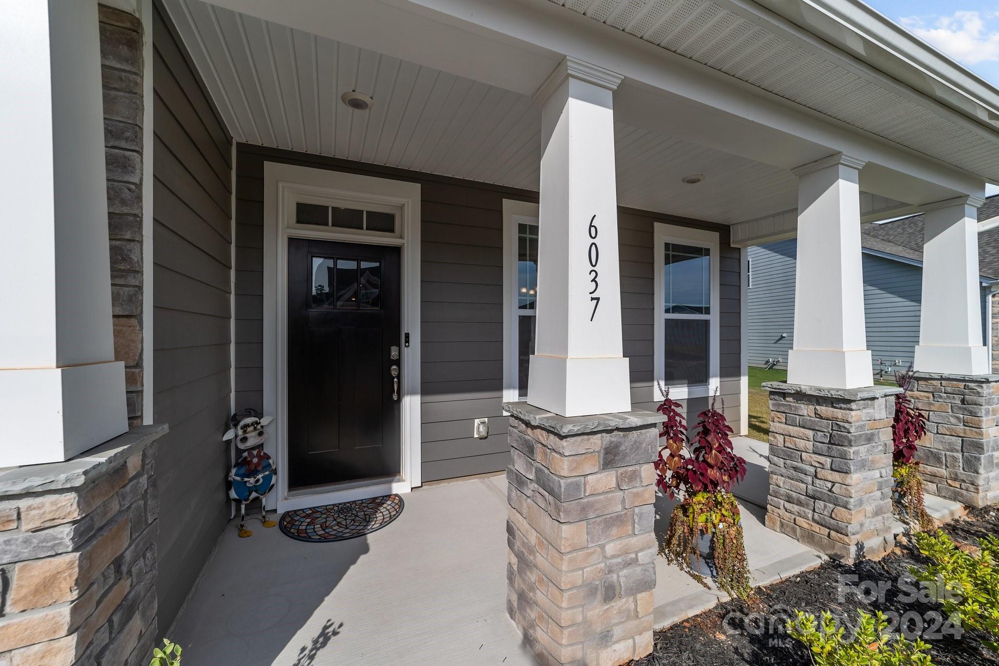 6037 Treehouse Drive Charlotte, NC 28214 - Photo 2 of 48 a view of two chairs in the balcony