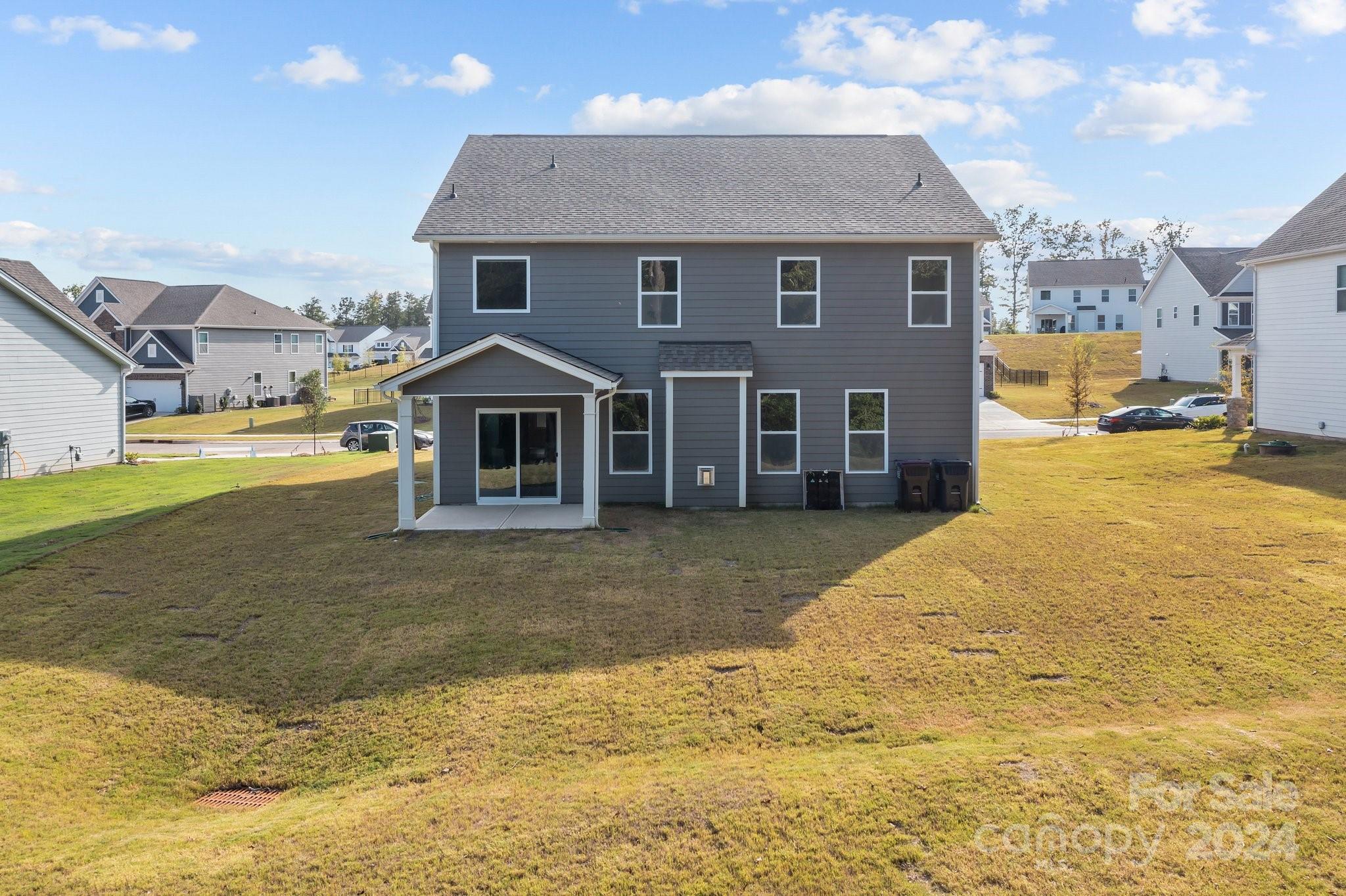 6037 Treehouse Drive Charlotte, NC 28214 - Photo 36 of 48 a front view of a house with a ocean view