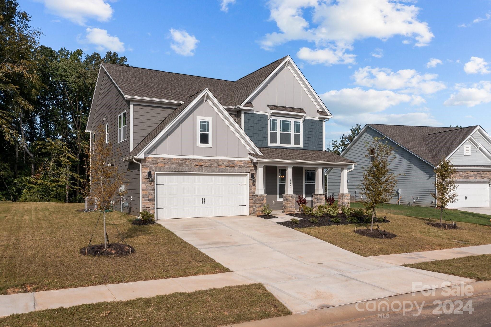 6037 Treehouse Drive Charlotte, NC 28214 - Photo 38 of 48 a front view of a house with a yard