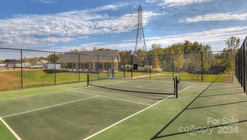 6037 Treehouse Drive Charlotte, NC 28214 - Photo 43 of 48 a view of a tennis court