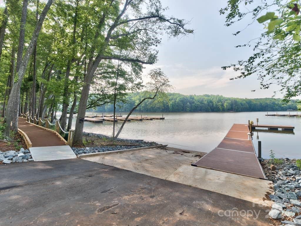 6037 Treehouse Drive Charlotte, NC 28214 - Photo 47 of 48 a view of a road with a yard