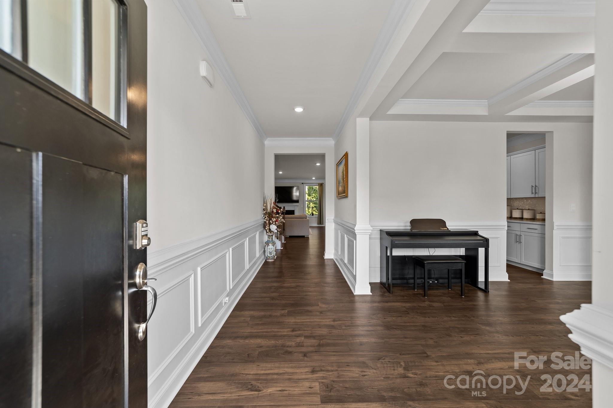6037 Treehouse Drive Charlotte, NC 28214 - Photo 5 of 48 a hallway with wooden floor