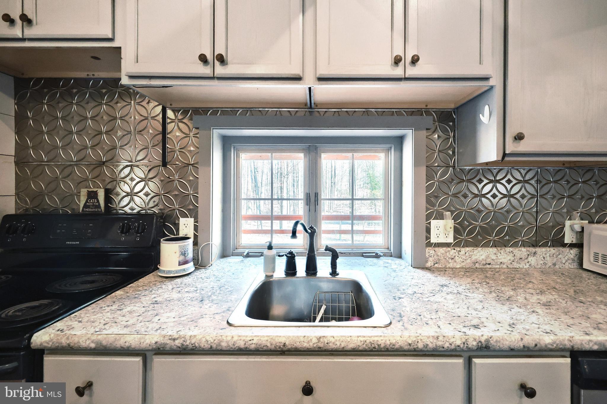 6227 Pigeon Hill Road Spring Grove, PA 17362 - Photo 11 of 50 a kitchen with a sink and a window