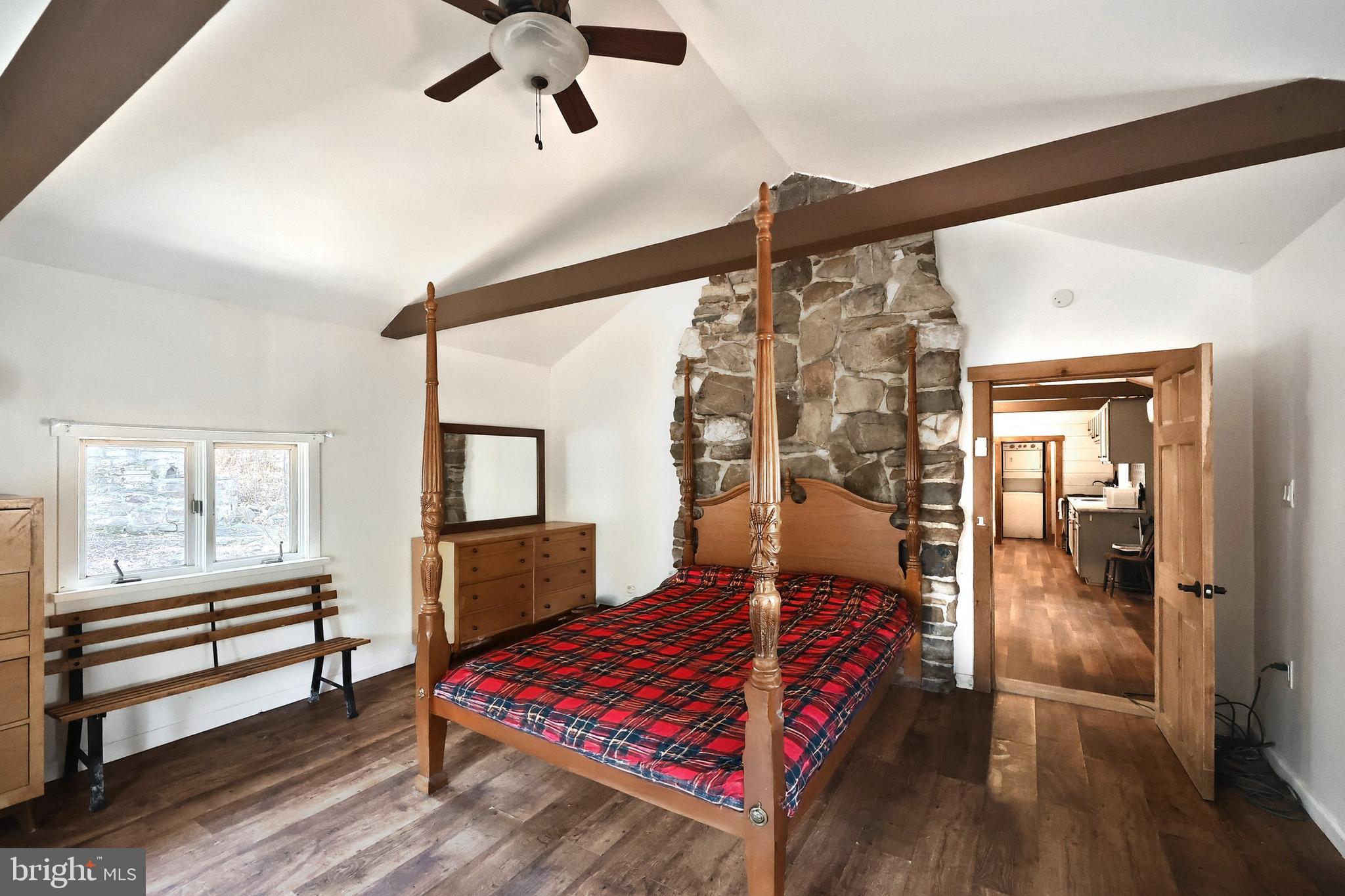 6227 Pigeon Hill Road Spring Grove, PA 17362 - Photo 13 of 50 a bedroom with a bed and wooden floor