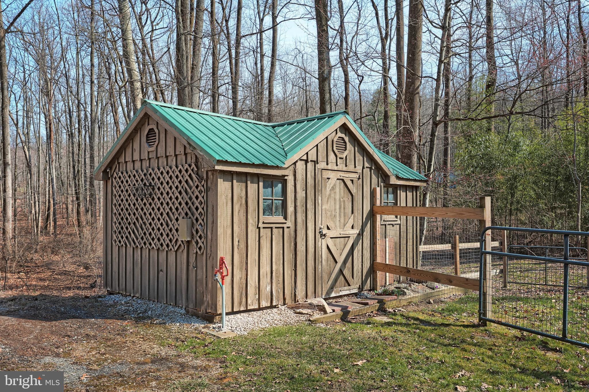6227 Pigeon Hill Road Spring Grove, PA 17362 - Photo 27 of 50 a front view of a house with garden