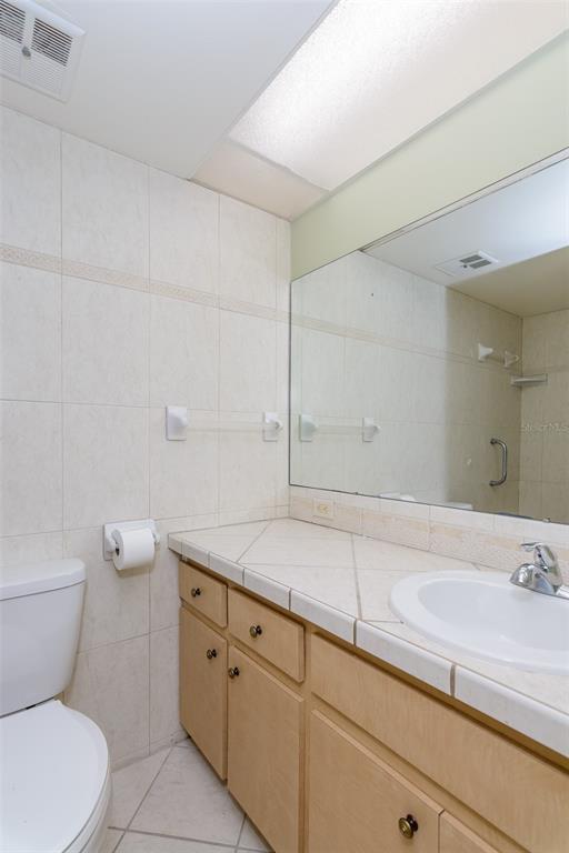 2101 Sunset Point Road, Unit 1003 Clearwater, FL 33765 - Photo 23 of 39 Primary En-Suite