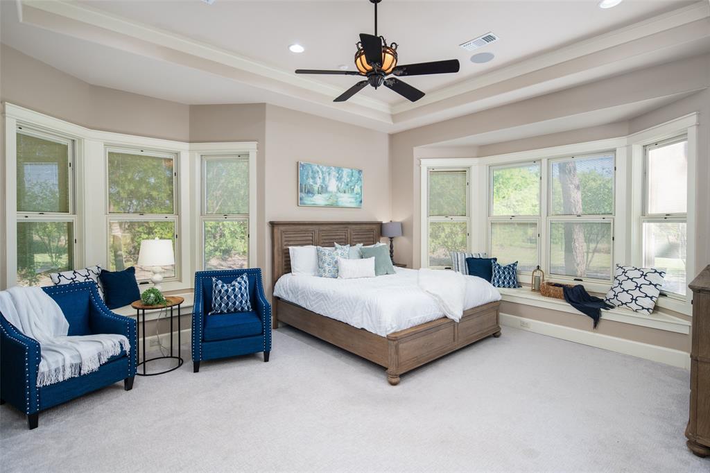 1814 Stacy Road Fairview, TX 75069 - Photo 13 of 33 1st floor primary suite; window bench seats with storage; coffered ceiling; crown molding; large walk-in closet
