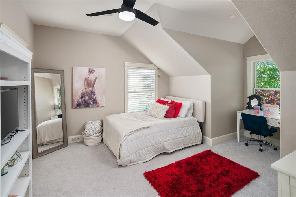 1814 Stacy Road Fairview, TX 75069 - Photo 18 of 33 Upstairs bedroom with room for dressing table or desk; walk-in closet