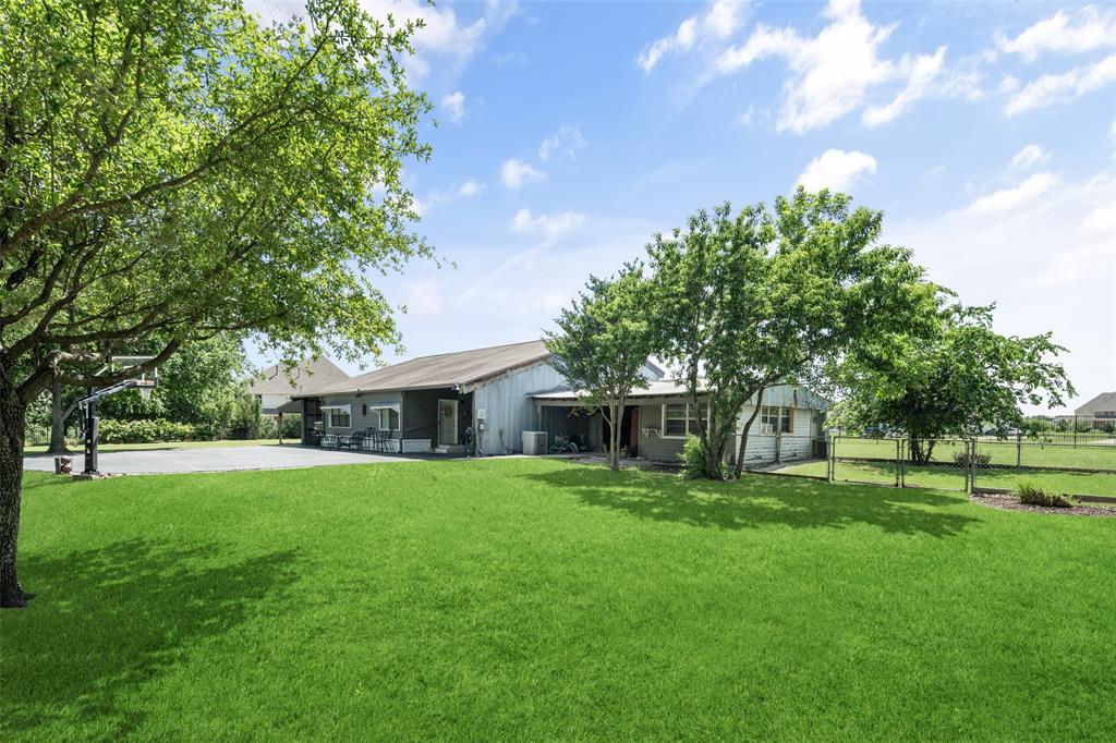 1814 Stacy Road Fairview, TX 75069 - Photo 25 of 33 Beautiful grassy area between main home and guest house