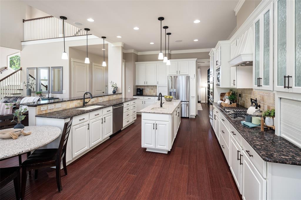 1814 Stacy Road Fairview, TX 75069 - Photo 7 of 33 Exceptional chef's style kitchen with multiple prep and storage areas
