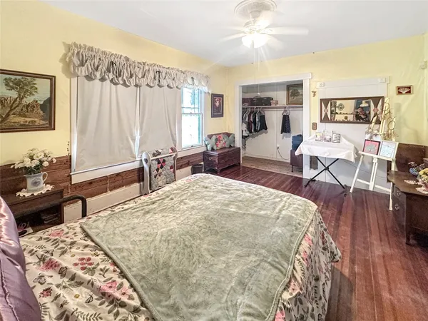 a bed room with a bed and a couch