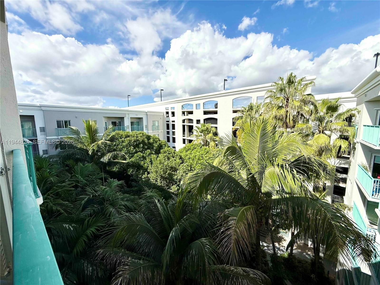 6001 Southwest 70th Street, Unit 612 South Miami, FL 33143 - Photo 11 of 20 a view of a garden