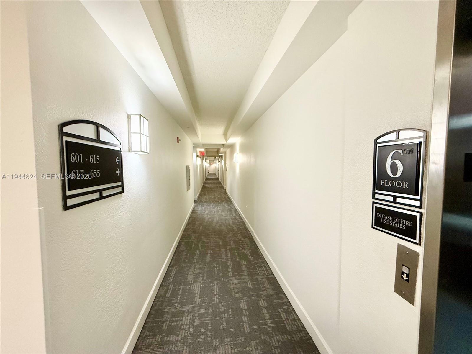 6001 Southwest 70th Street, Unit 612 South Miami, FL 33143 - Photo 19 of 20 a hallway with entryway