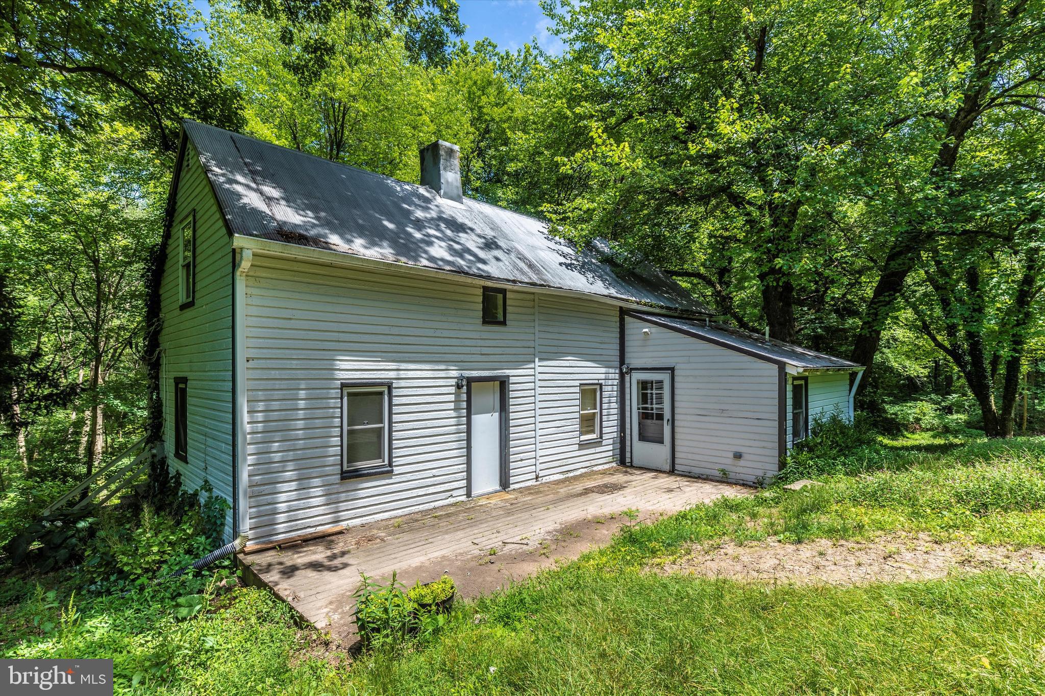 6300 Old Bohn Road Mount Airy, MD 21771 - Photo 6 of 45 a view of a house with a yard
